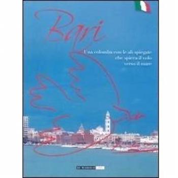Bari. Una colomba con le ali spiegate che spicca il volo verso il mare